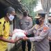 Polisi Bagikan Belasan Ton Beras ke Masyarakat Terdampak Pandemi